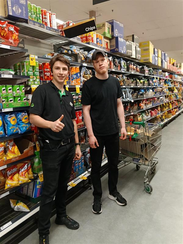 Pictured: Peter with Woolworths Greensborough Store Manager Matt during his work experience placement.